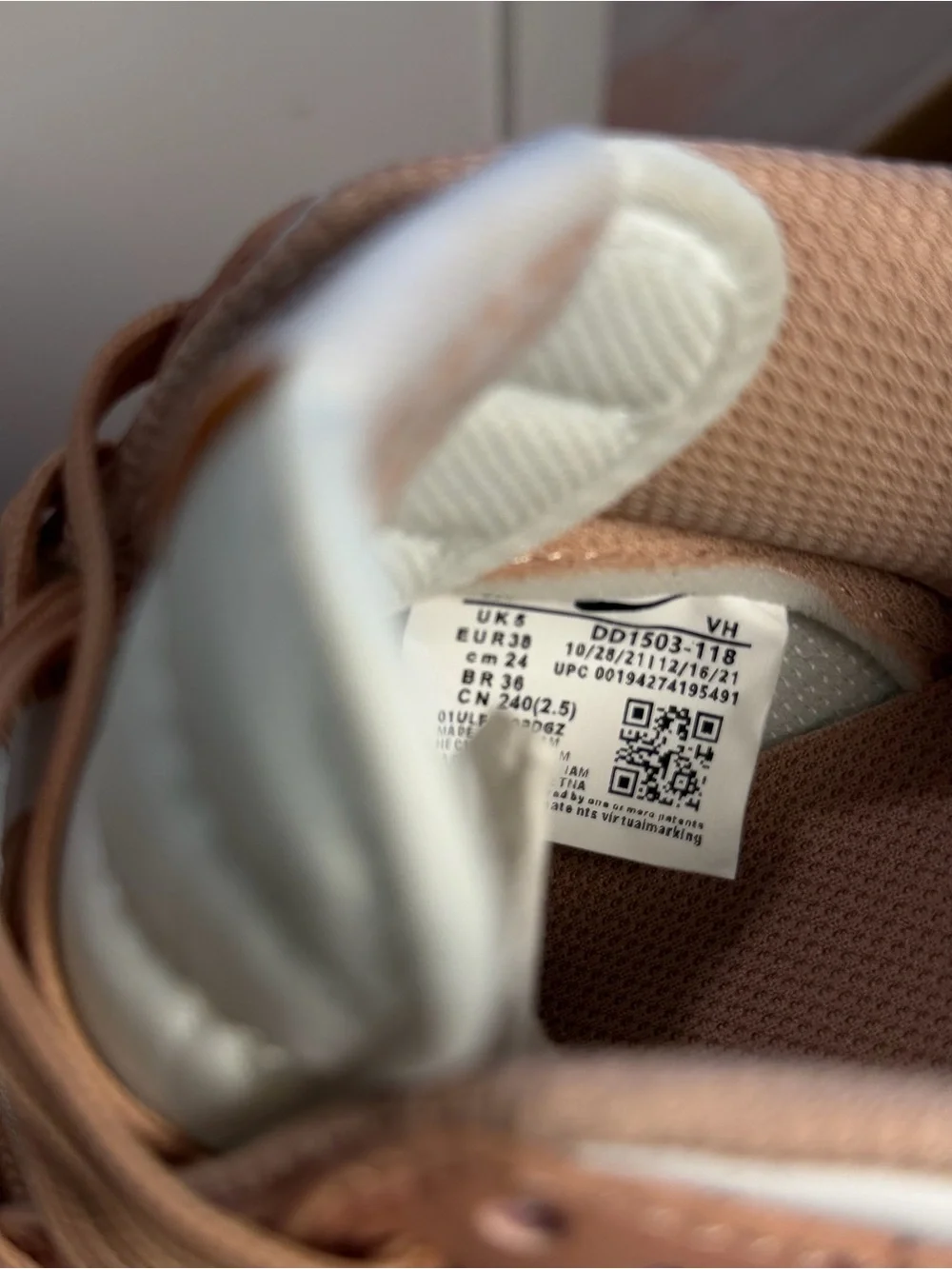 Nike Women’s Low-Top Sneakers in Blush Pink and White